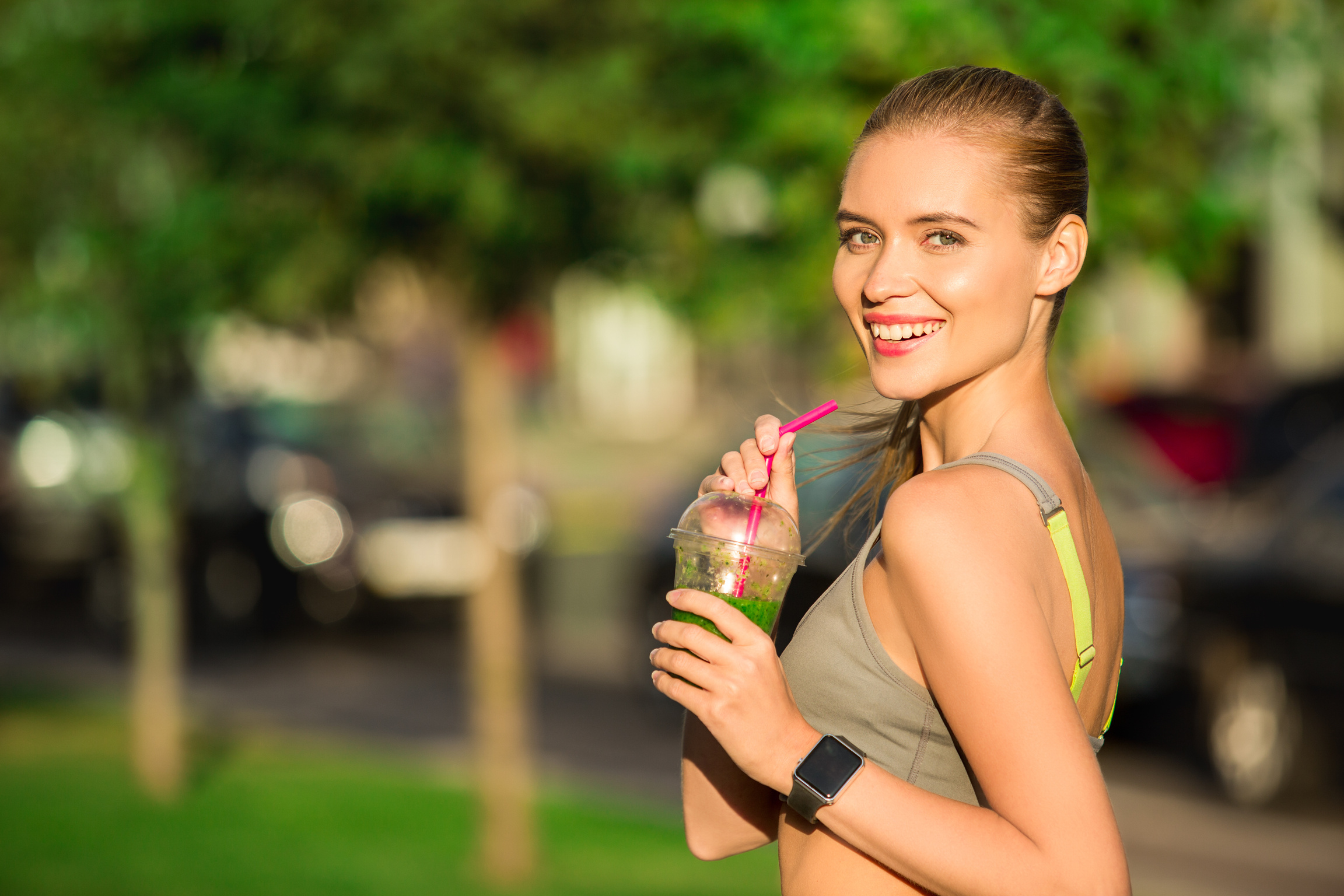 Young woman drink smoothie healthy detox outdoors